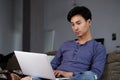 Asian Man Working Laptop Home Connecting Networking Concept Royalty Free Stock Photo