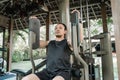 Asian man workout with pec deck machine Royalty Free Stock Photo