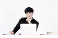 Asian manager businessman sitting at desk and working, isolated Royalty Free Stock Photo