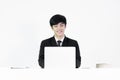 Asian manager businessman sitting at desk and working, isolated Royalty Free Stock Photo