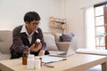 Asian Mature adult man having video call consulting with doctor medicine on laptop from home, telehealth or telemedicine Royalty Free Stock Photo