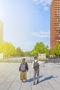 Asian Mature Couple Traveling Together in Tokyo, Japan at Daytime