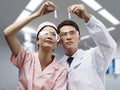 Asian medical professionals at work Royalty Free Stock Photo