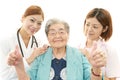 Asian medical staff with old women Royalty Free Stock Photo