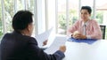 Asian man in job interview at office background, job search, business concept Royalty Free Stock Photo