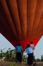 Asian Men standing in front of hot air balloon over Bagan Royalty Free Stock Photo