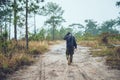 Asian men travel photograph nature. Travel relax. Walk on the path. Nature Study in the Jungle. Thailand Royalty Free Stock Photo