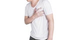 Asian men use hands to hold their hearts. Showing pain from heart disease,Heart attack symptom Healthcare and medical concept Royalty Free Stock Photo