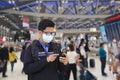 Asian men wear masks, protect against coronary viruses, prevent infectious diseases and prevent the flu in airports and