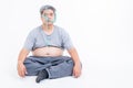 Asian middle-aged men are stressed about obesity and anxiety plus shape, Using measure the size wrap around the head Royalty Free Stock Photo