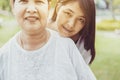 Asian middle mother happy with daughter at nature,Positive thinking,Happy and smiling,Elderly social asia concept Royalty Free Stock Photo