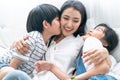 Asia mom playing with her son and daughter, They smile happily, Love, Family ties, Single Mother. Royalty Free Stock Photo