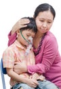 Asian mother comforts her son Royalty Free Stock Photo