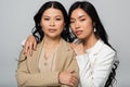 asian mother and daughter embracing isolated Royalty Free Stock Photo