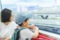 Asian mother and her son sitting in commuter train Royalty Free Stock Photo