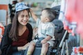 asian mother with her toddler boy shopping in the baby shop Royalty Free Stock Photo