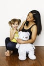 Asian mother holding her 3-year-old daughter Royalty Free Stock Photo