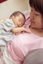 Asian mother with newborn baby in the hospital Royalty Free Stock Photo