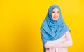 Asian Muslim Arab beautiful woman wear veil hijab crossed arm Royalty Free Stock Photo