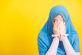 Woman wear veil hijab she sad crying using hand wiping tears in her eyes Royalty Free Stock Photo