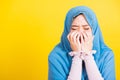 Woman wear veil hijab she sad crying using hand wiping tears in her eyes Royalty Free Stock Photo