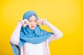 Woman wear veil hijab she sad crying using hand wiping tears in her eyes Royalty Free Stock Photo