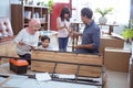 muslim family at their new house buying and assembling new furniture Royalty Free Stock Photo