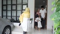 asian muslim family visiting friend during eid fitri mubarak