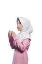 Asian muslim girl wearing veil and praying to god Royalty Free Stock Photo