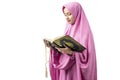 Asian Muslim man woman in a veil holding prayer beads and reading the Quran Royalty Free Stock Photo