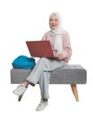 asian muslim student holding laptop in front of white Royalty Free Stock Photo