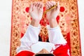 Asian Muslim woman praying with beads chain Royalty Free Stock Photo