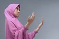 Asian muslim woman wearing traditional clothes praying Royalty Free Stock Photo