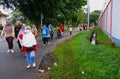Asian Muslim women are on a healthy walk in the city of Muntok during the day