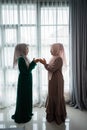 Asian moslem woman say salam when meeting her friend Royalty Free Stock Photo