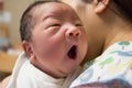 Asian new born baby yawning Royalty Free Stock Photo