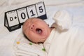 Asian new born baby yawning Royalty Free Stock Photo