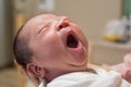 Asian new born baby yawning Royalty Free Stock Photo