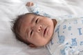 Asian newborn crying on white towel Royalty Free Stock Photo