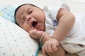 asian newborn yawning