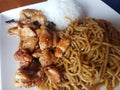 Asian noodles, white rice, and chicken meat