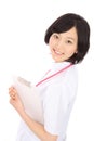 Asian nurse with a clipboard Royalty Free Stock Photo