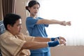 Asian nurse therapists stretching arm muscles treatment of physiological.