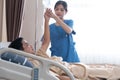 Asian nurse therapists stretching arm muscles treatment of physiological.