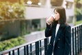 asian office women and coffee cup  with face mask Royalty Free Stock Photo