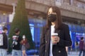asian office women and coffee cup  with face mask Royalty Free Stock Photo