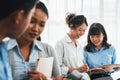 Asian office worker with smile working together in office. Meticulous