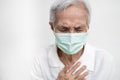 Asian old elderly have difficulty breathing,tired patient suffering from pain,chest feel tight,acute dyspnea,asthma,shortness of