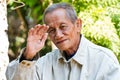 Asian old senior man candid portrait Royalty Free Stock Photo