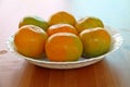 Asian orange or tangerine in white plate